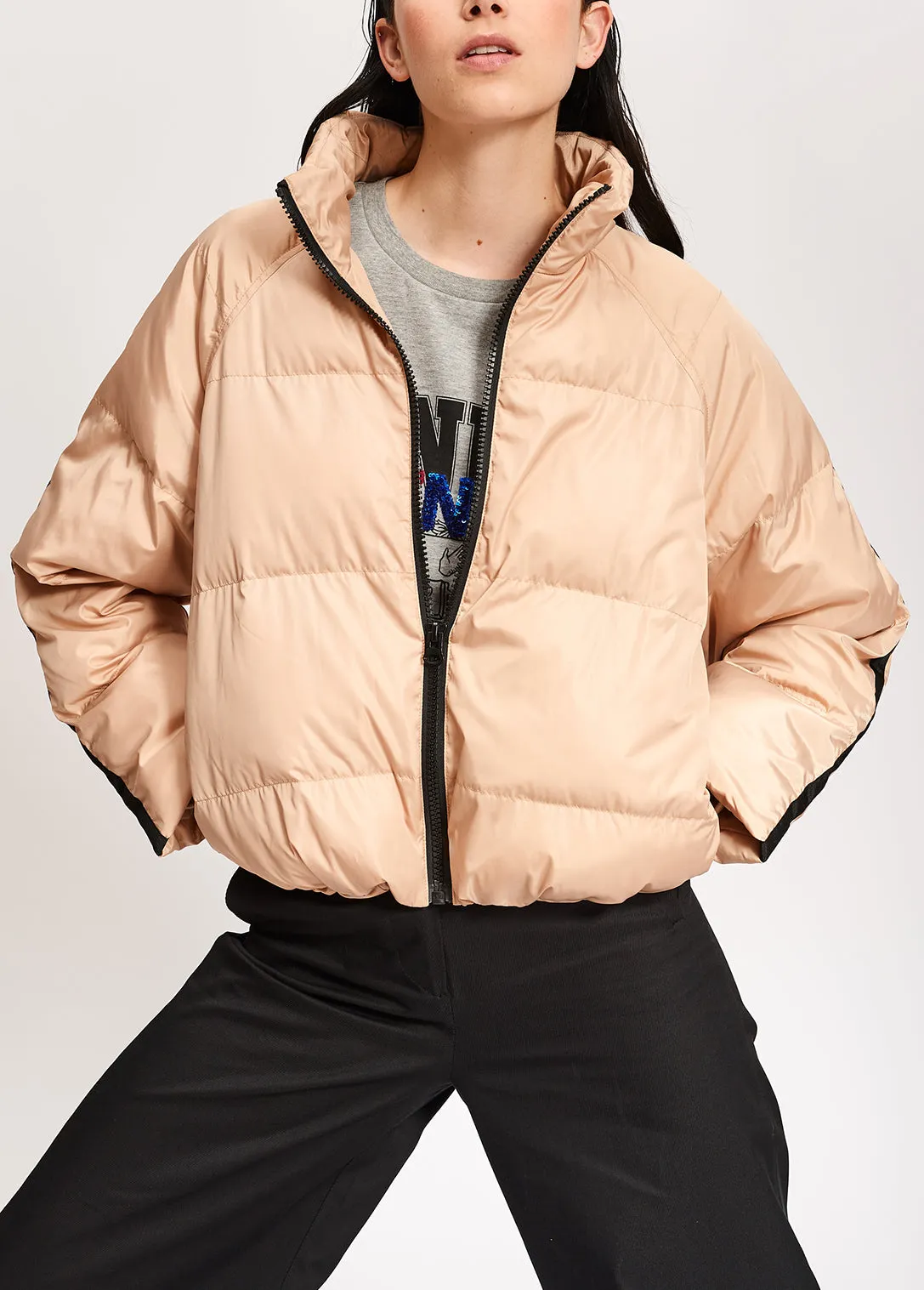 Beige quilted down jacket