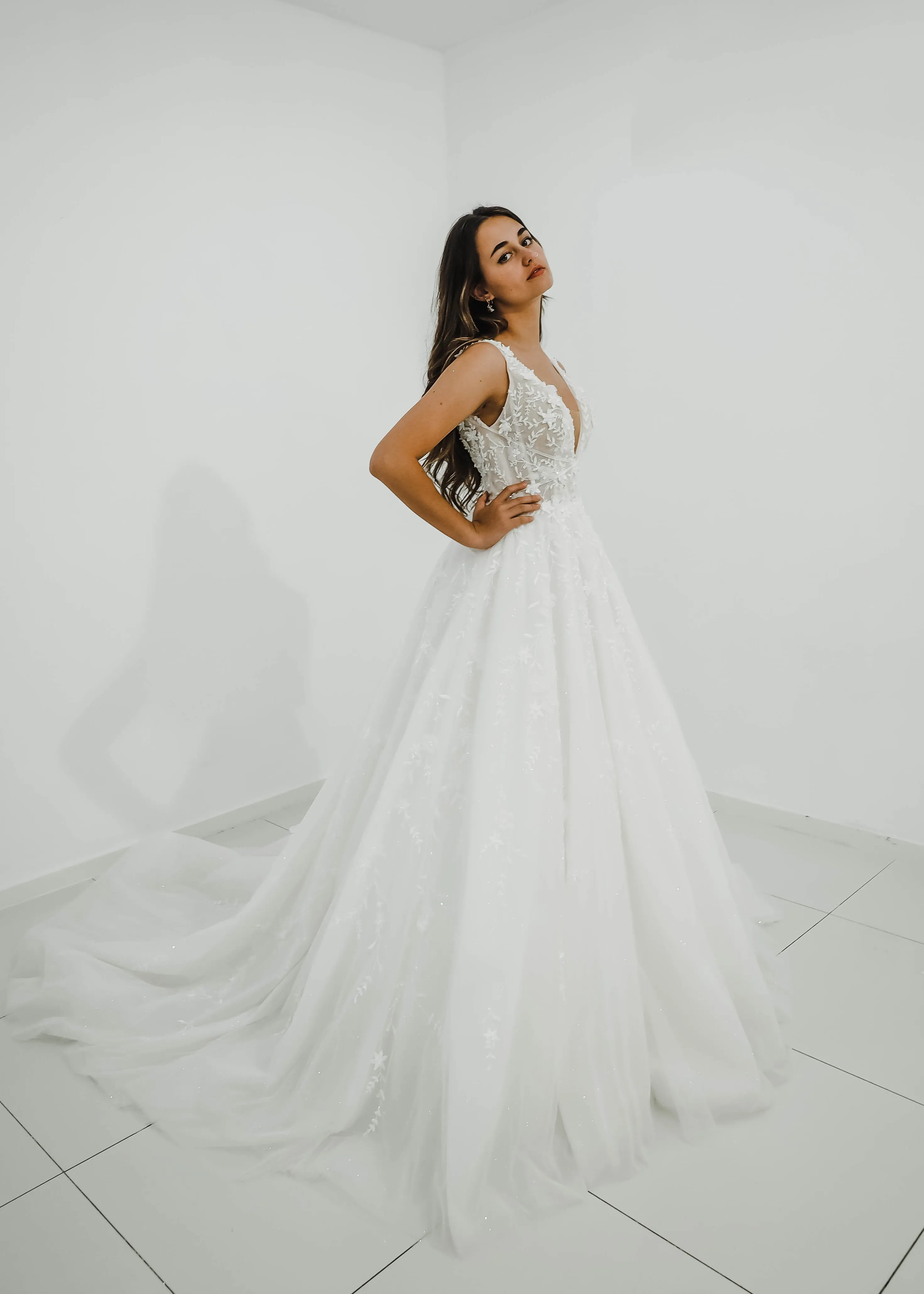 Sparkling white V neck wedding dress with open back for hire