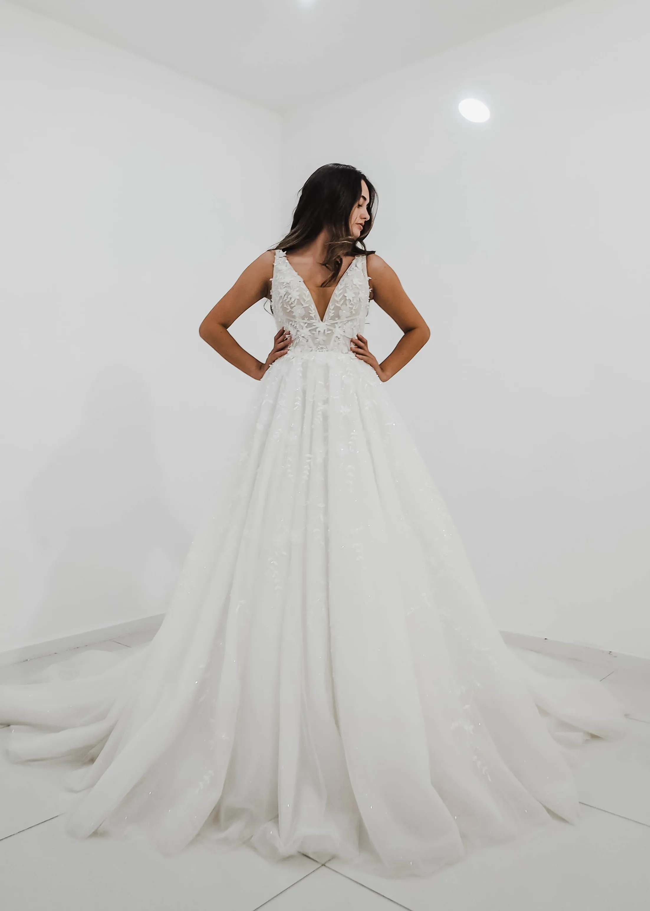 Sparkling white V neck wedding dress with open back for hire