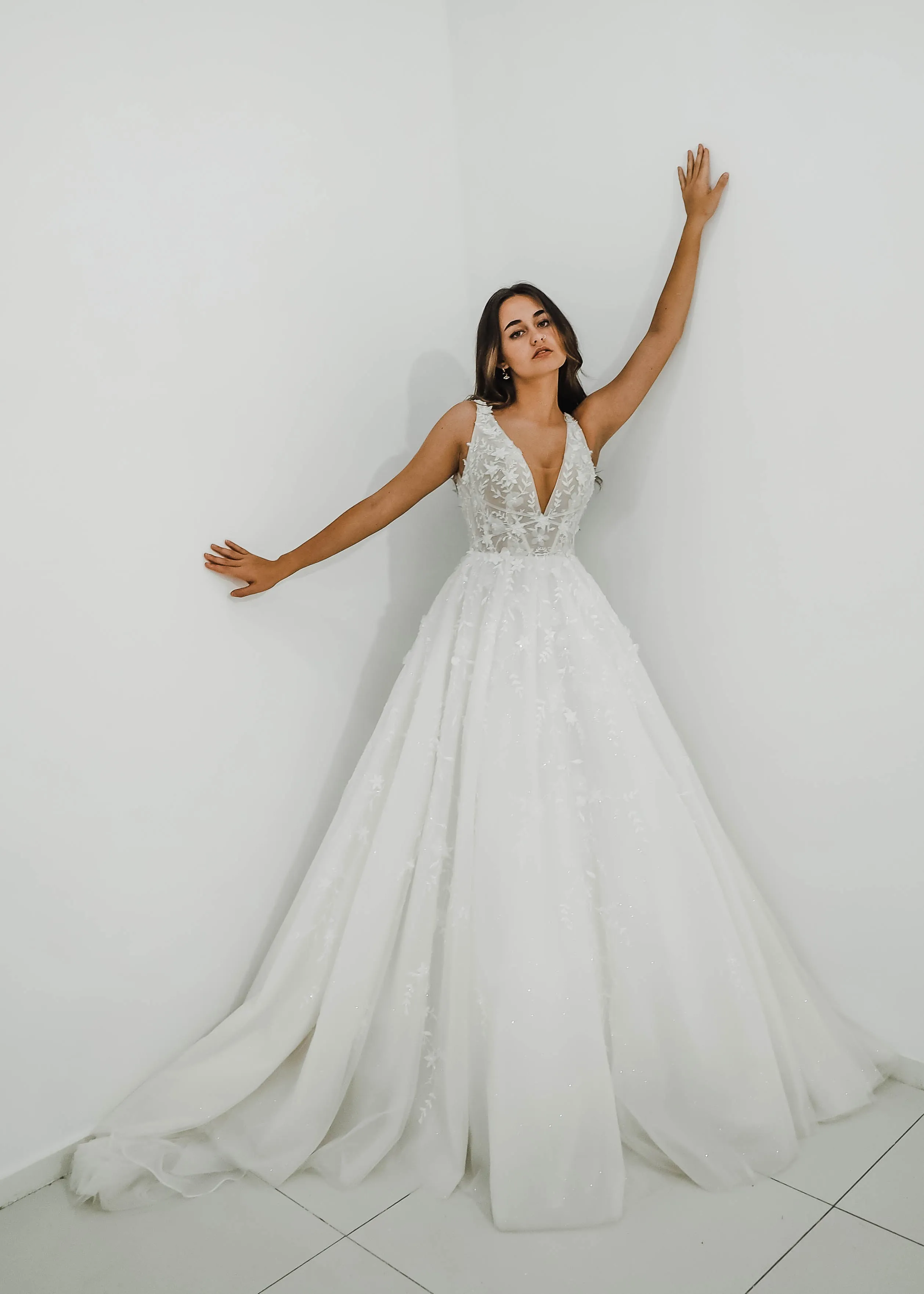 Sparkling white V neck wedding dress with open back for hire