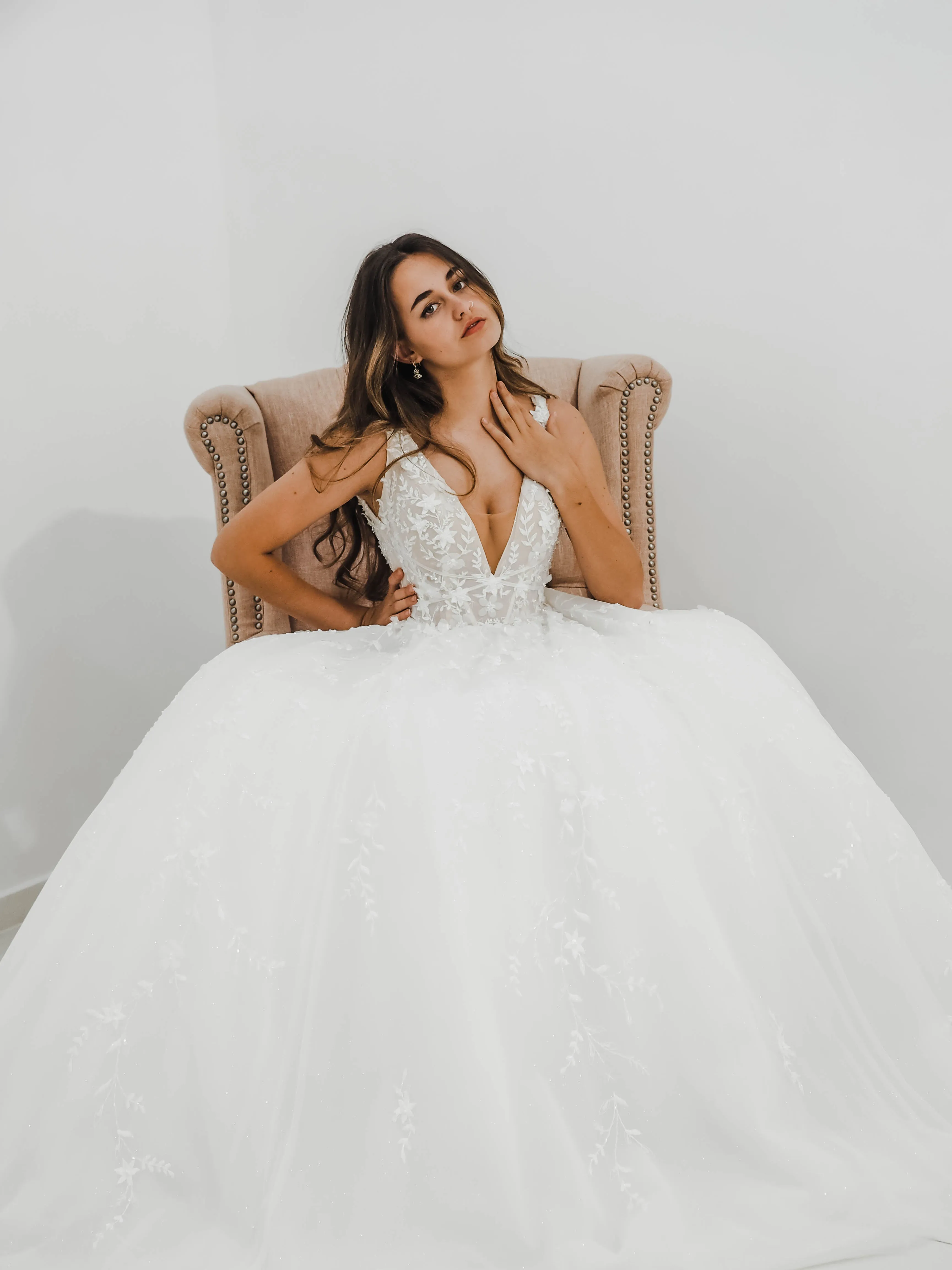 Sparkling white V neck wedding dress with open back for hire