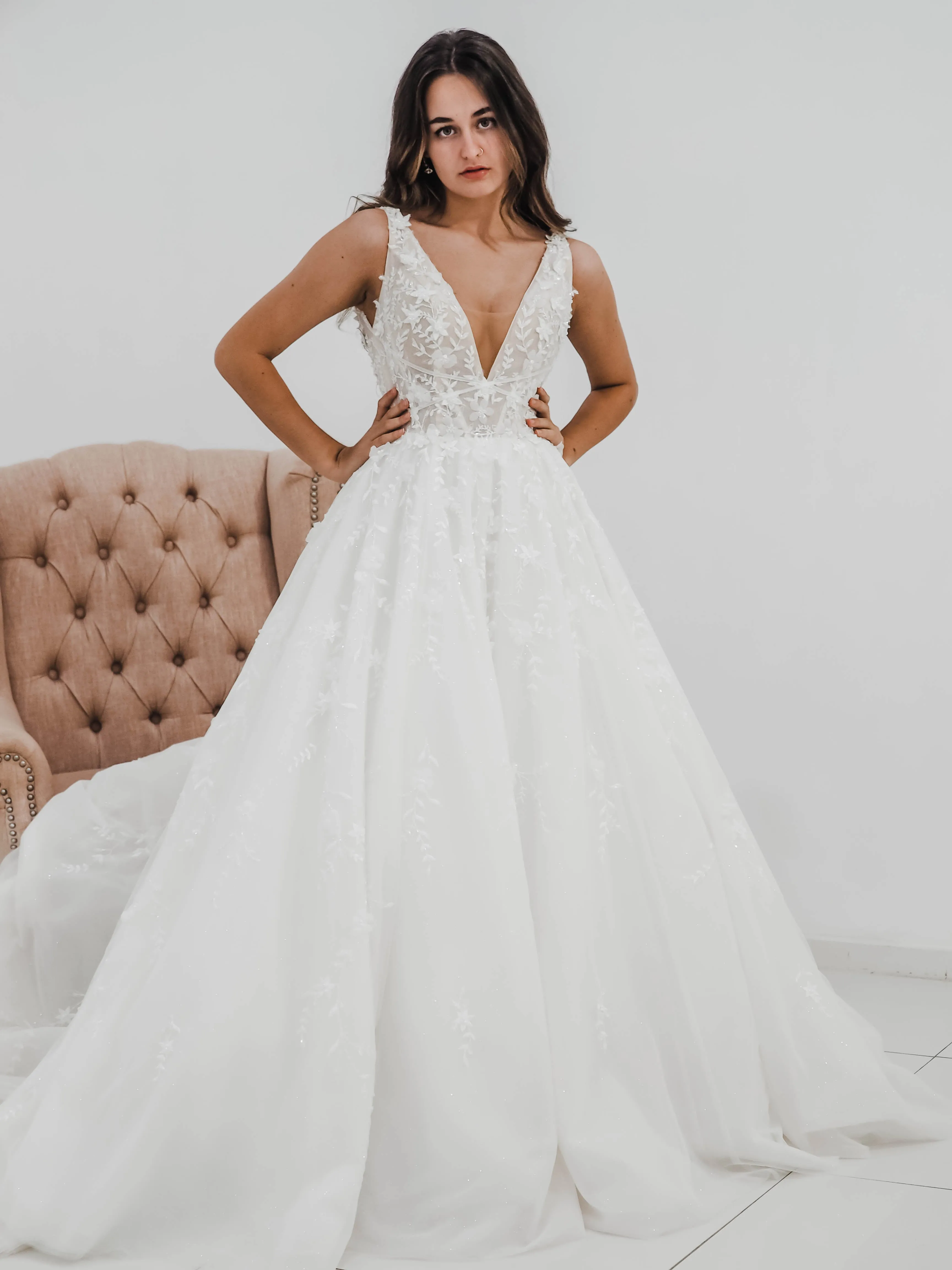 Sparkling white V neck wedding dress with open back for hire