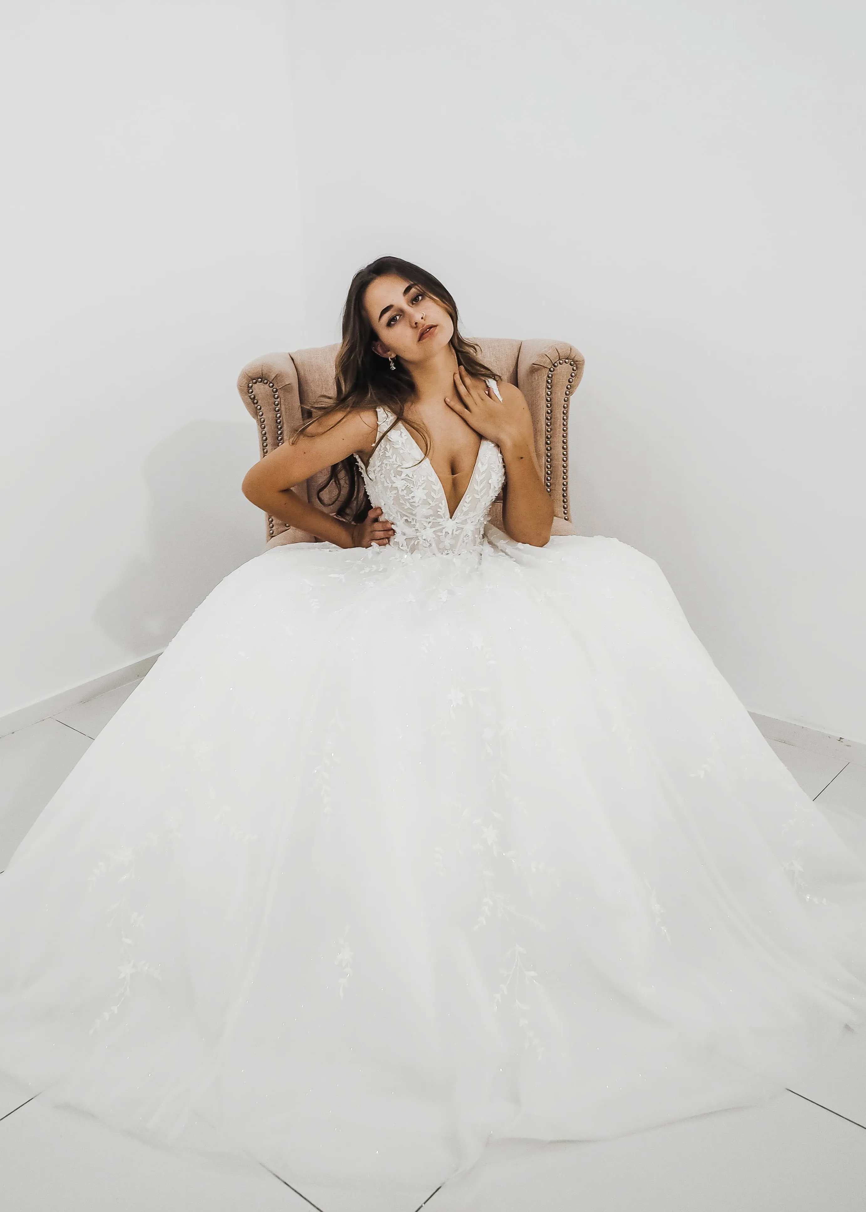 Sparkling white V neck wedding dress with open back for hire