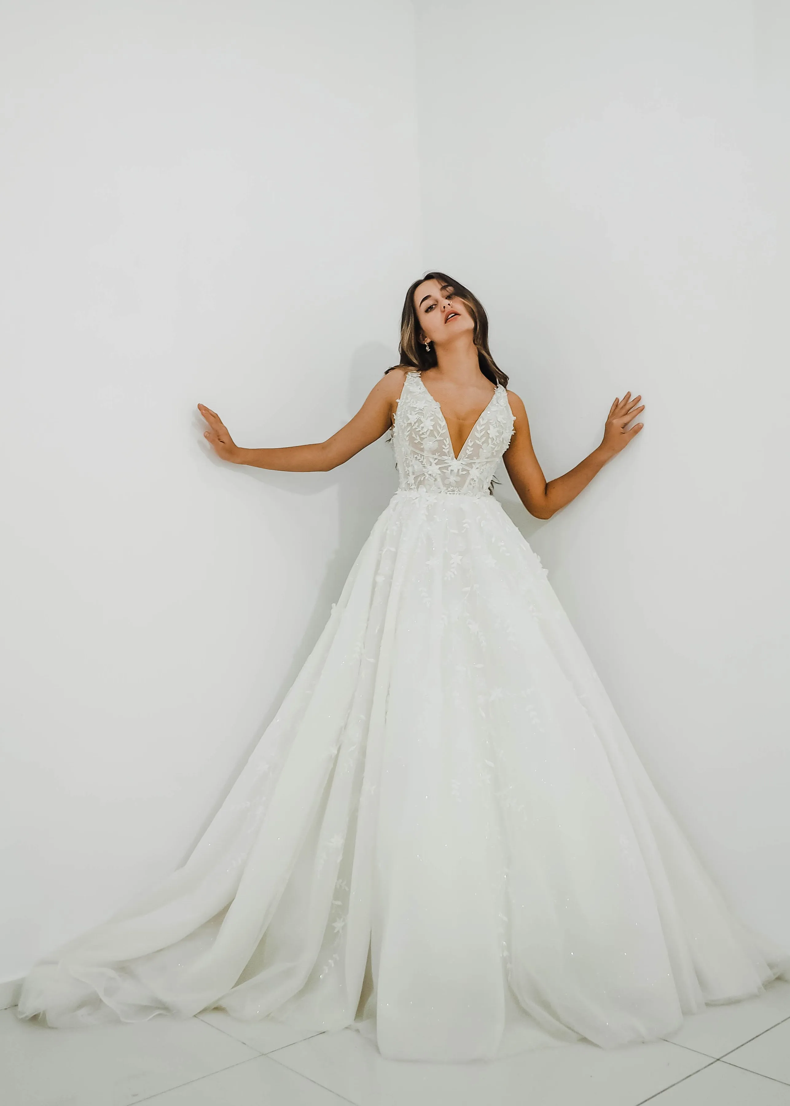 Sparkling white V neck wedding dress with open back for hire