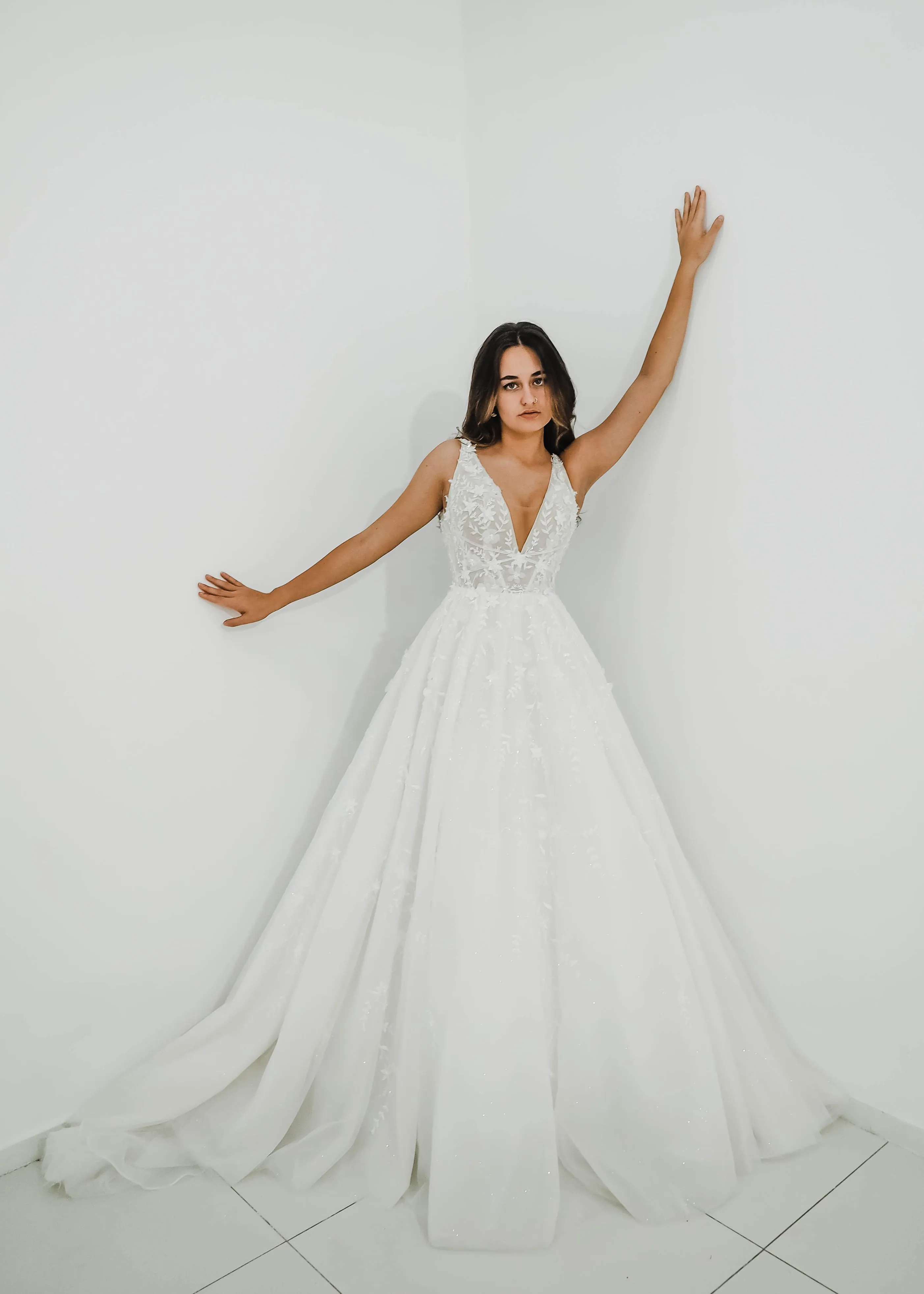 Sparkling white V neck wedding dress with open back for hire