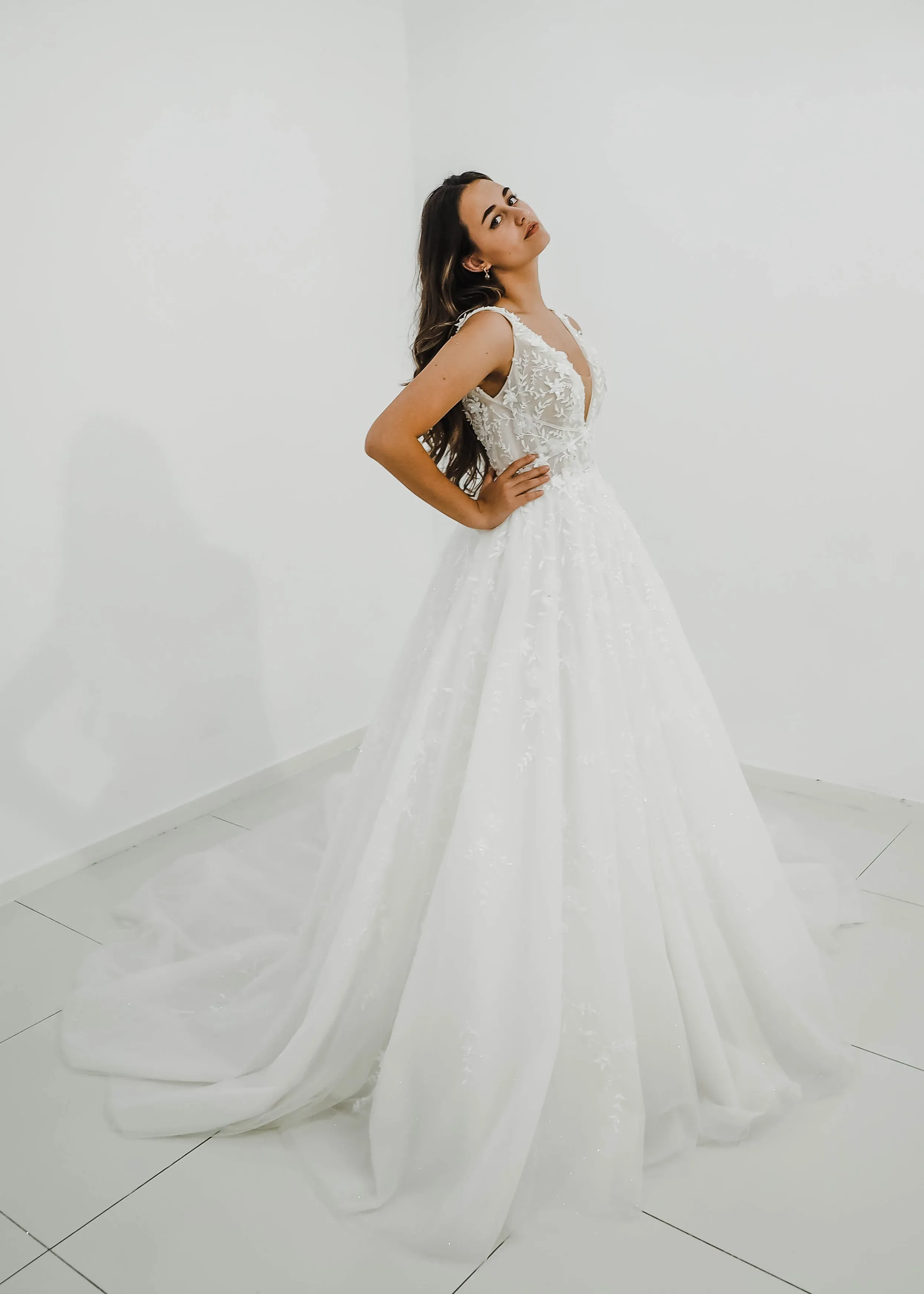 Sparkling white V neck wedding dress with open back for hire
